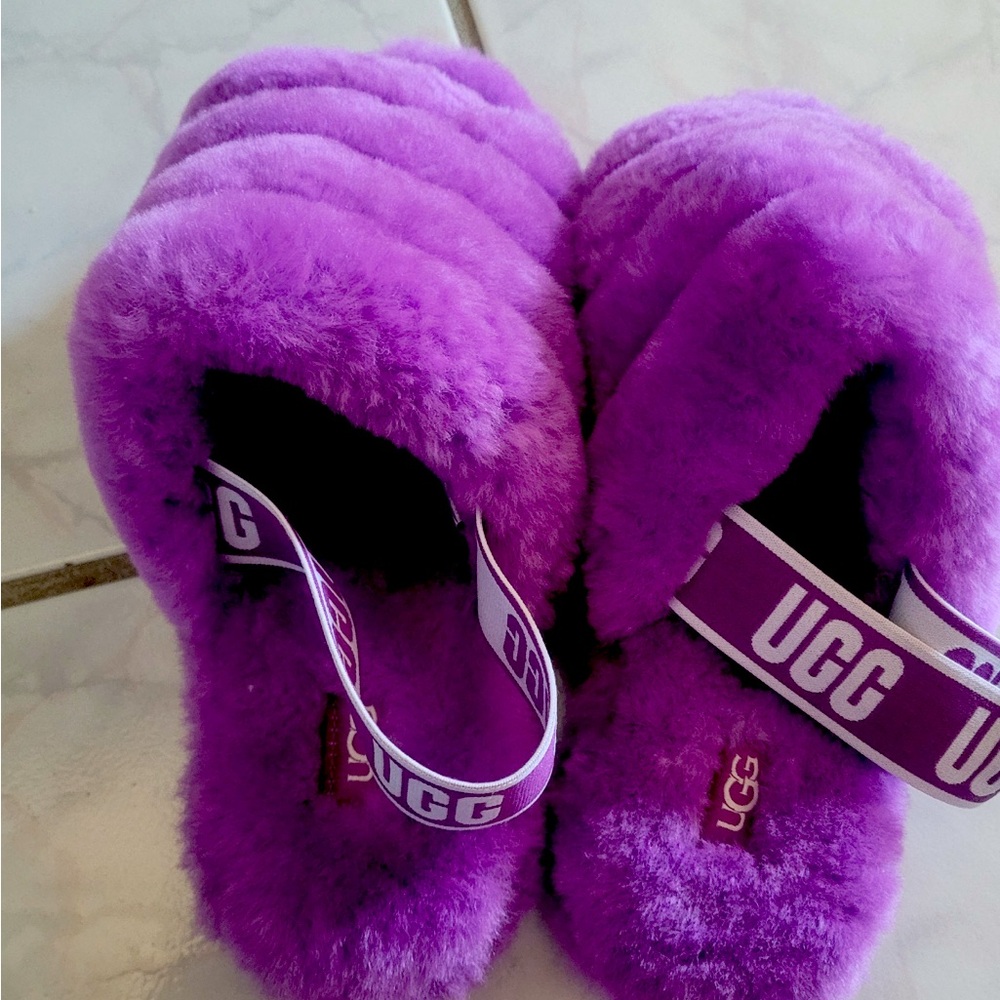 Uggs 2 pair available, pink or purple , size 8-9. Never worn